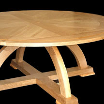 Round oak table by Paul Mowbray